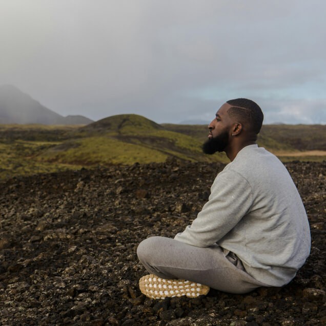 Man meditating in nature