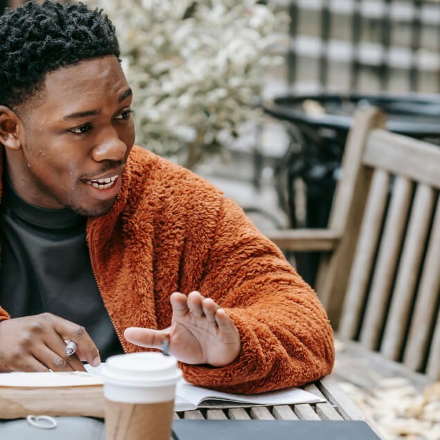 Man smiling with coffee